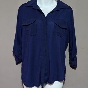 Blue button-down shirt with sheer back